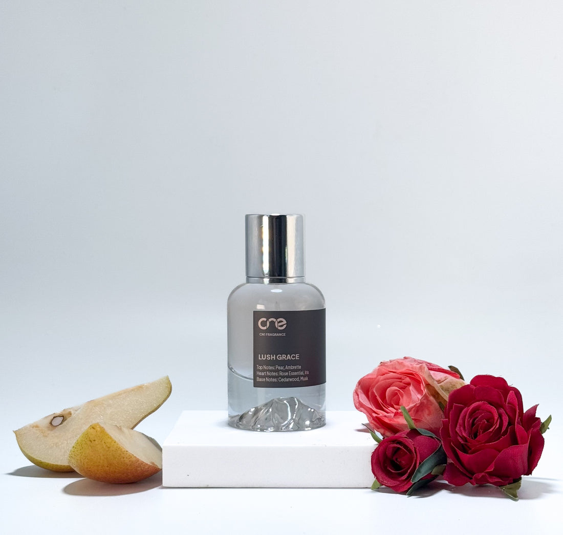 Elegant bottle of Lush Grace by CN1 Fragrance placed on a soft floral background, capturing the essence of its radiant and feminine scent inspired by Givenchy Irresistible.