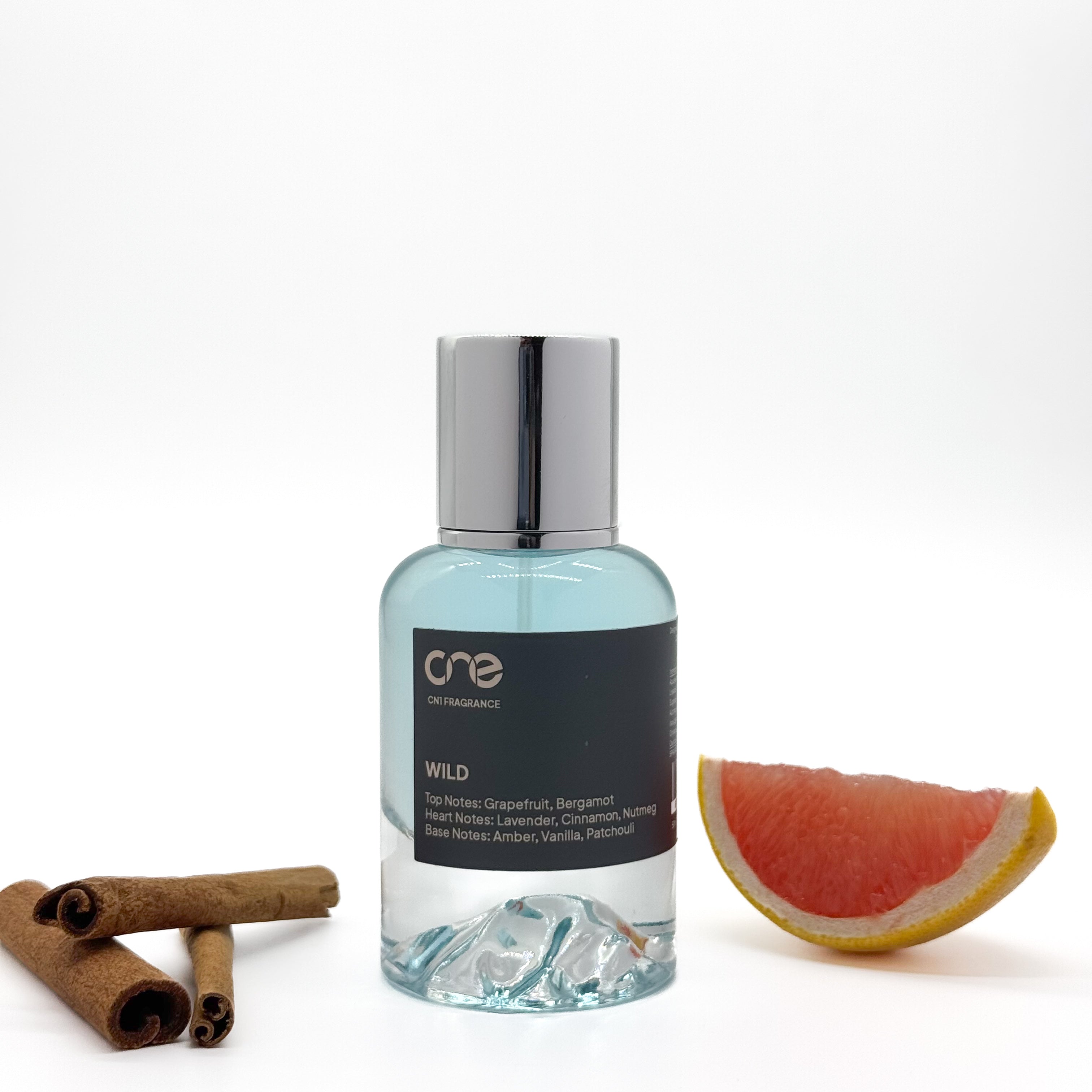 Product image of Wild Eau De Parfum by CN1 Fragrance featuring rich notes of spicy cardamom, aromatic lavender, and earthy vetiver, with a hint of sweet vanilla for a warm, alluring scent.